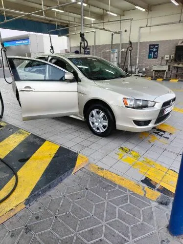 Mitsubishi Lancer 2010 — MzadQatar