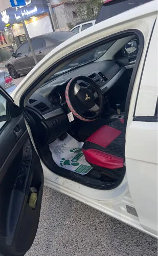 Mitsubishi Lancer 2013 — MzadQatar
