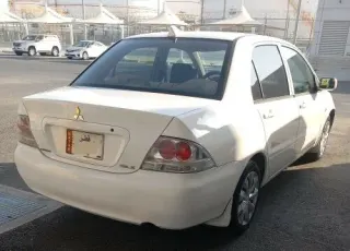 Mitsubishi Lancer 2009 — MzadQatar