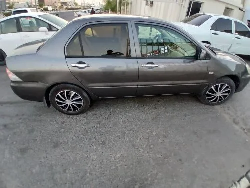 Mitsubishi Lancer 2010 — MzadQatar