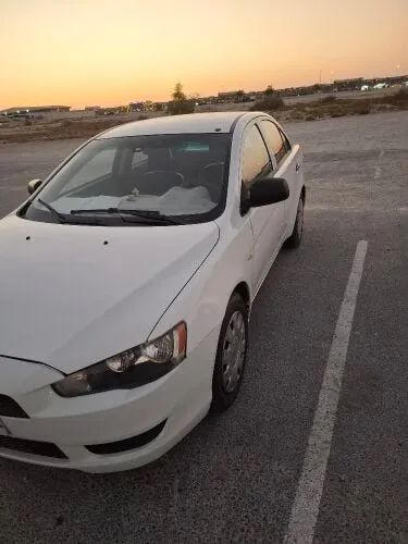 Mitsubishi Lancer 2014 — MzadQatar