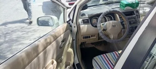 Nissan Tiida 2009 — MzadQatar