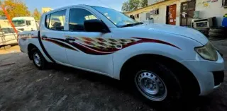 Mitsubishi L200 2011 — MzadQatar