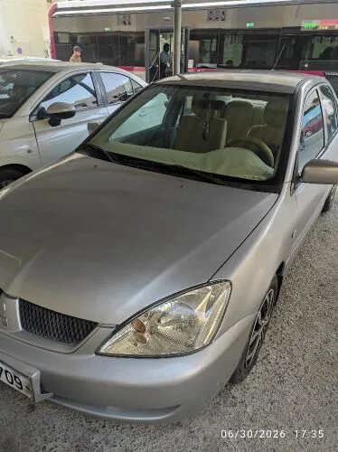 Mitsubishi Lancer 2009 — MzadQatar