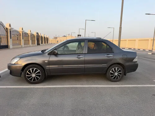 Mitsubishi Lancer 2010 — MzadQatar