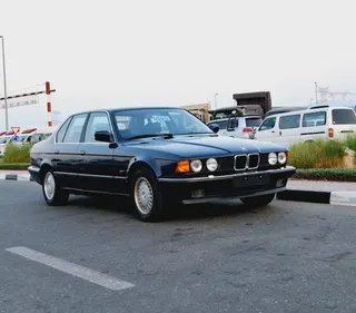 بي إم دبليو 7 Series 1990 — OneClickDrive