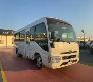 Toyota Coaster 2024 — OneClickDrive